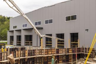 Food Hub concrete pour at loading docks, May 16, 2024